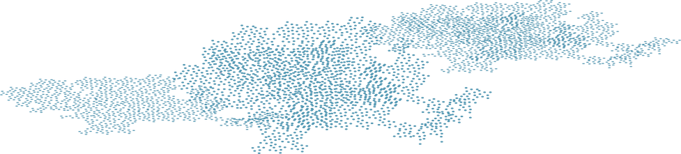 Blue cluster of dots in form of city at night, as seen from space.